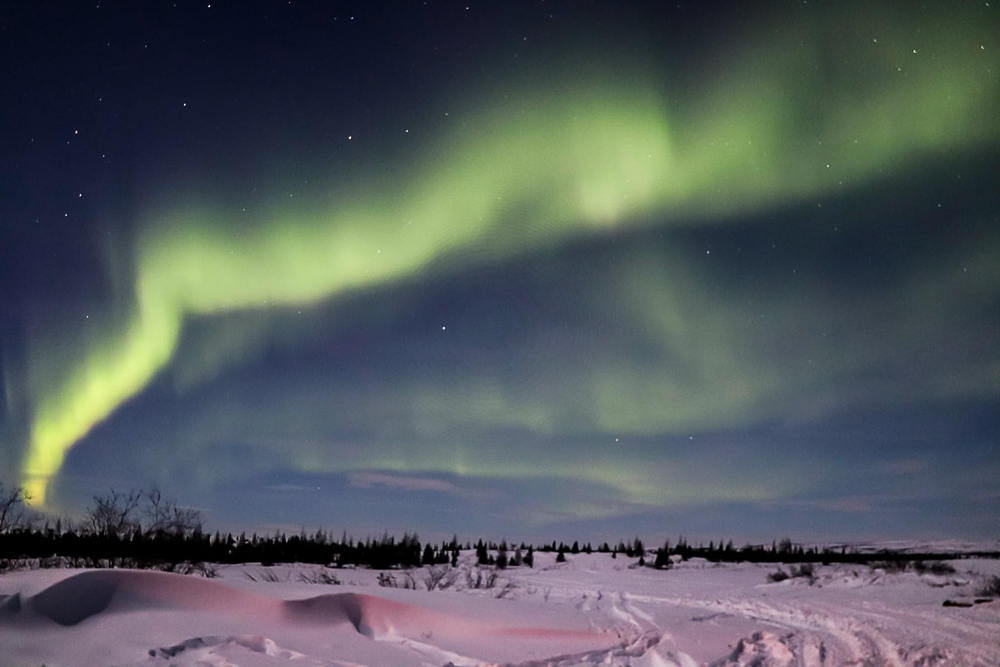 Une aurore boréale en bordure de Kuujjuaq en plein hiver - Crédit Photo Maxence Chavanne